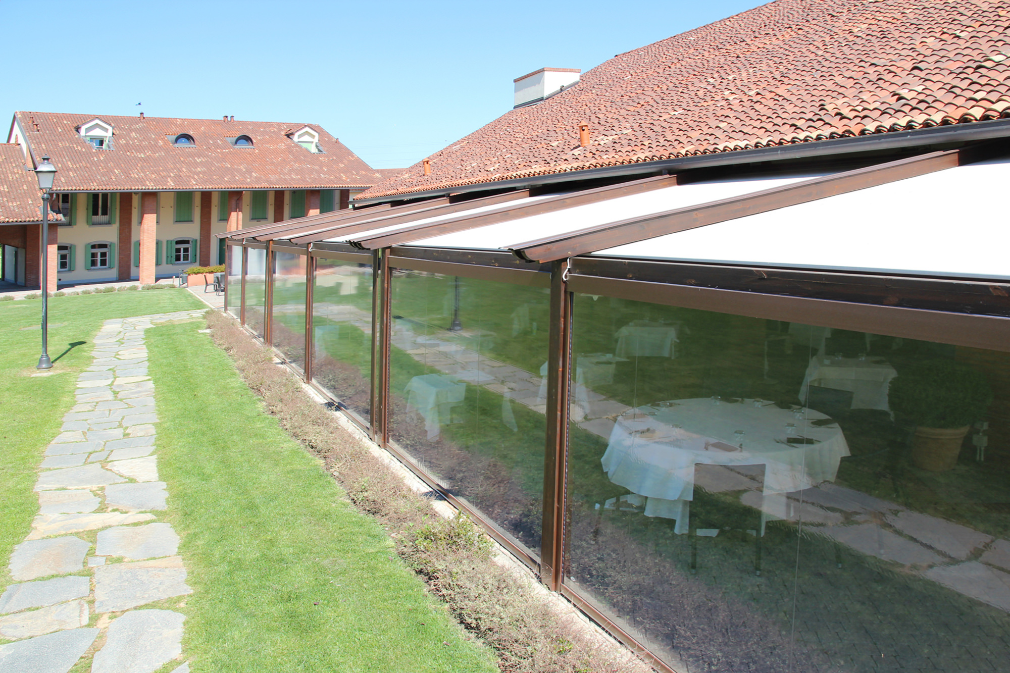 Z115-ZIP-PLUS-4 Zip-Roll Retractable Shades are a cassette with a roll-up curtains designed to provide wind and rain protection. They are perfect for vertical openings in pergolas, patios, verandas and windows.