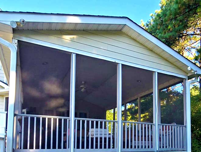 Transform your outdoor living space into a comfortable, protected retreat with a custom screened-in porch or patio.