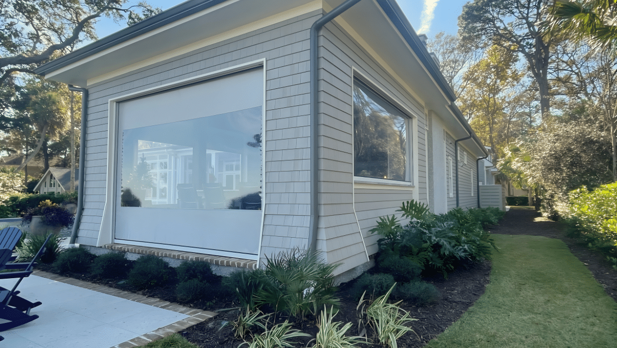 Motorized clear vinyl porch enclosure protection system