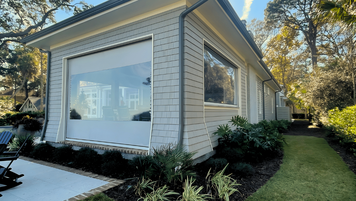 Motorized vinyl porch enclosure helping reduce pollen