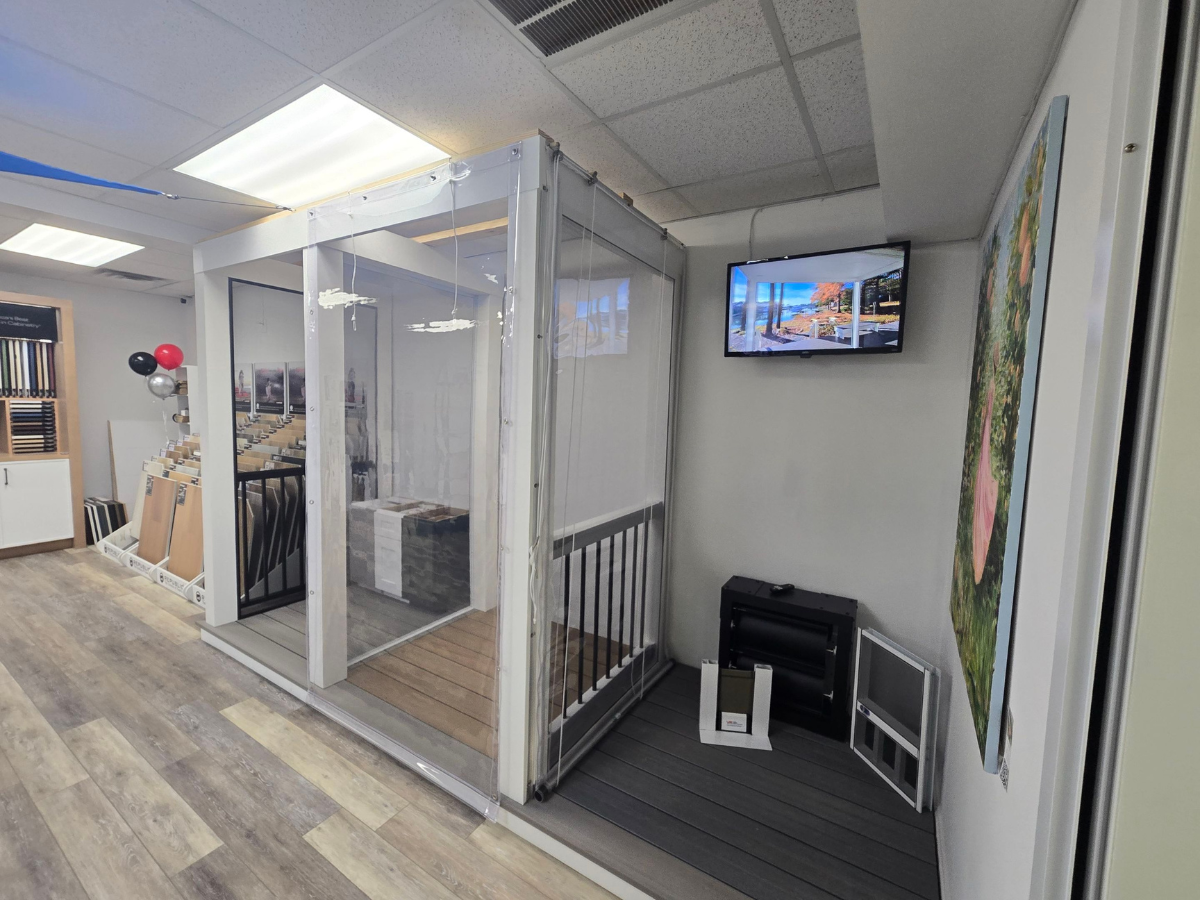 Vinyl Porch Enclosure Display in Maryland Showroom Outdoor Living Showroom Maryland with a full-size vinyl porch enclosure display demonstrating manual enclosure systems.