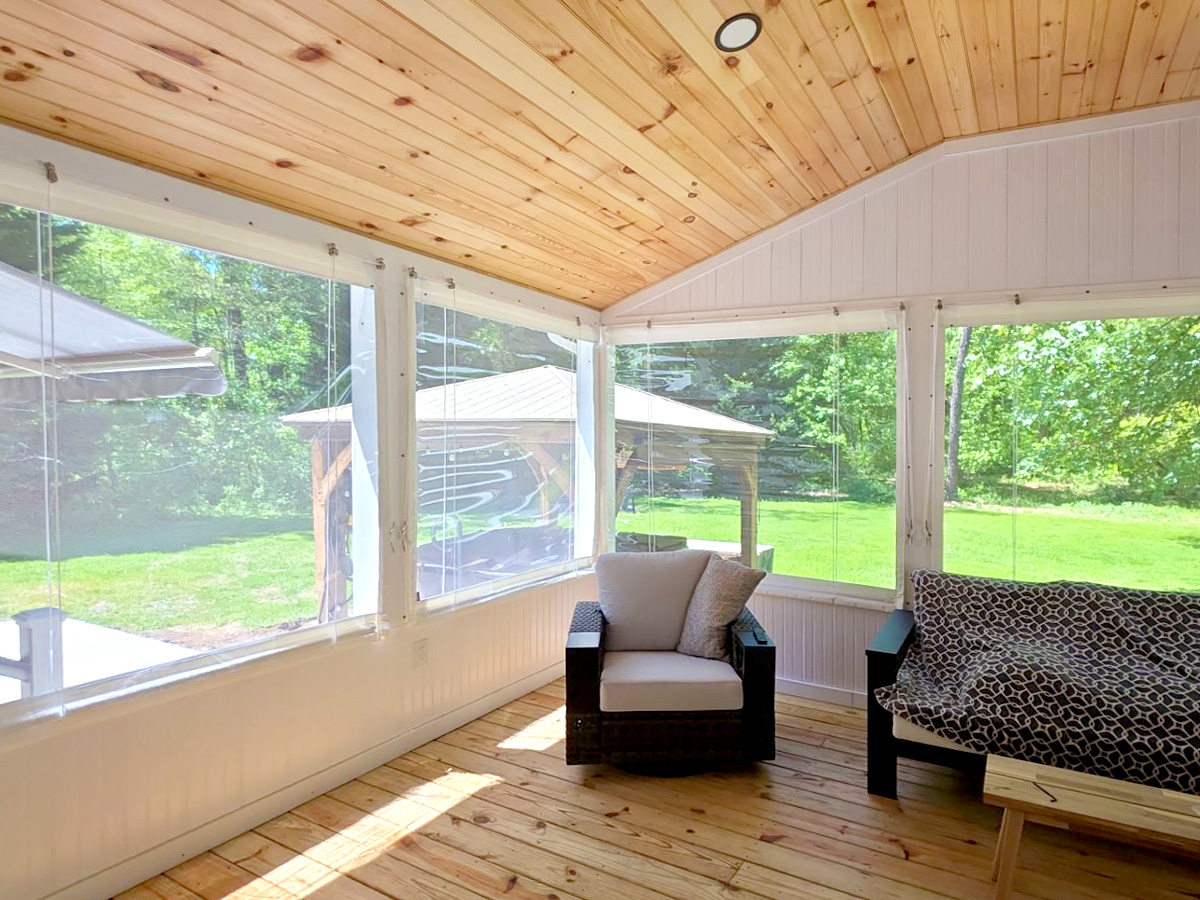 Inside Mounted Manual Roll-up Vinyl Porch Enclosure in Lewes, DE.