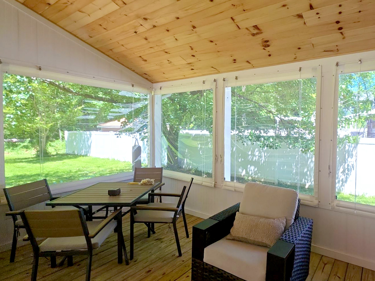 Inside Mounted Manual Roll-up Vinyl Porch Enclosure in Lewes, DE.